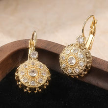 Load image into Gallery viewer, Ladies Gold Plated Round Floral Design White Synthetic Zirconia Hook Earrings.