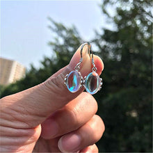 Load image into Gallery viewer, Ladies Silver Oval Moonstone Transparent Bead Silver Cutout Hook Earrings
