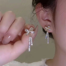 Load image into Gallery viewer, Ladies Gold Plated Sparkling Rhinestone Bowknot Tassel Drop Stud Earrings
