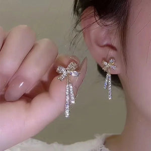 Ladies Gold Plated Sparkling Rhinestone Bowknot Tassel Drop Stud Earrings