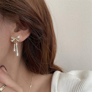 Ladies Gold Plated Sparkling Rhinestone Bowknot Tassel Drop Stud Earrings
