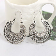 Load image into Gallery viewer, Ladies Silver Bohemian Retro Floral Cutout Round Wheel Dangle Earrings
