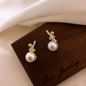 Ladies Gold Plated Sparkling Rhinestones Bowknot Simulated Pearl Stud Earrings
