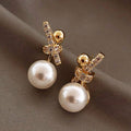 Ladies Gold Plated Sparkling Rhinestones Bowknot Simulated Pearl Stud Earrings