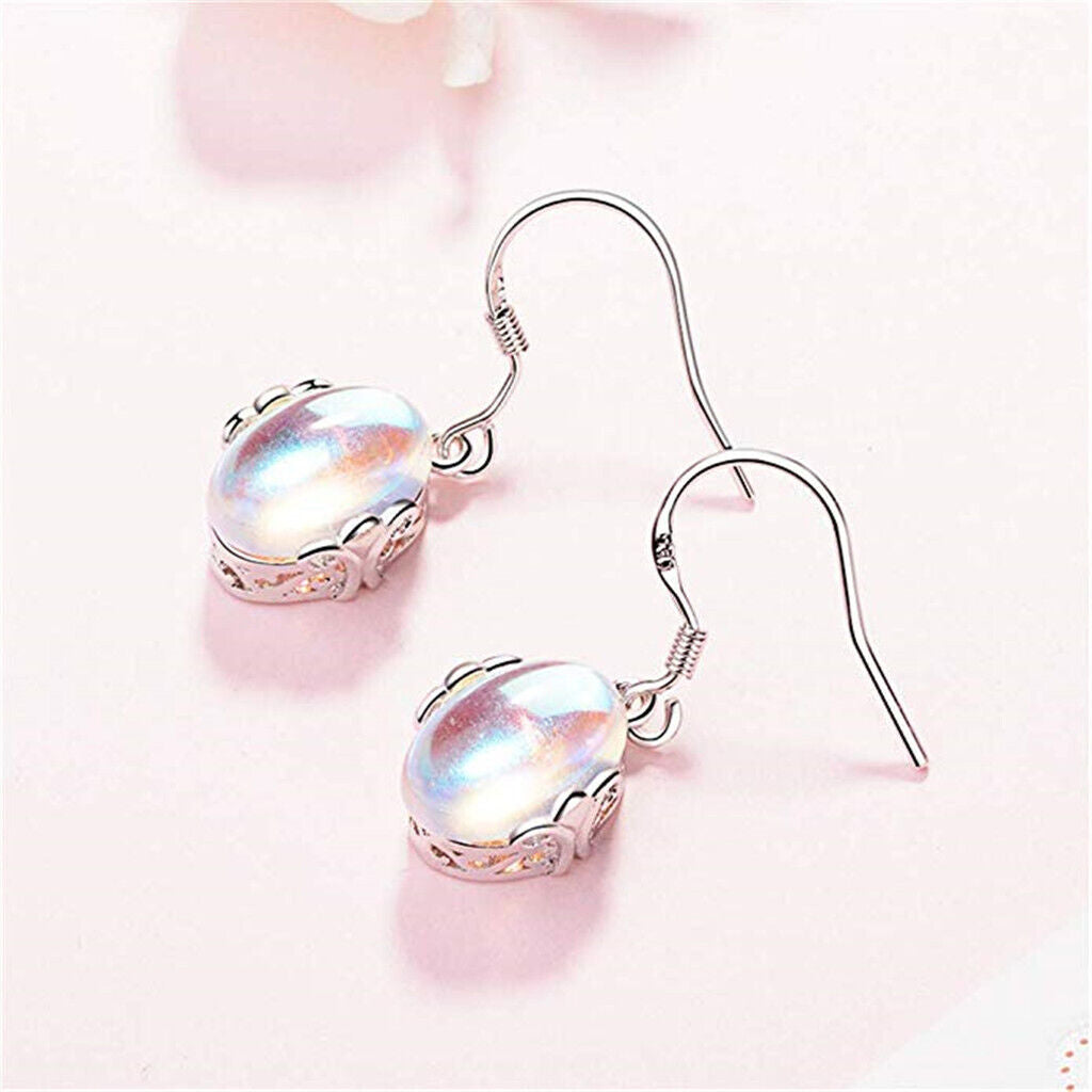 Ladies Silver Oval Moonstone Transparent Bead Silver Cutout Hook Earrings