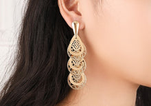 Load image into Gallery viewer, Ladies Gold Hollow Cut Out Tier Layered Geer Wheel Drop Earrings
